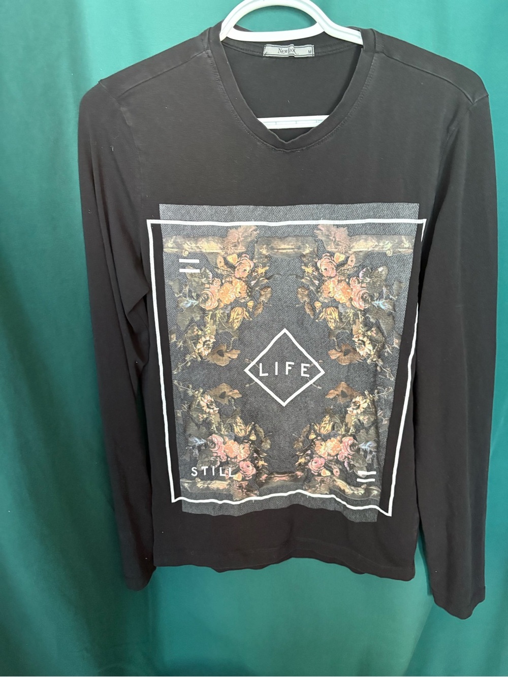 Black Long Sleeve Graphic Tee with Floral 'Print still life